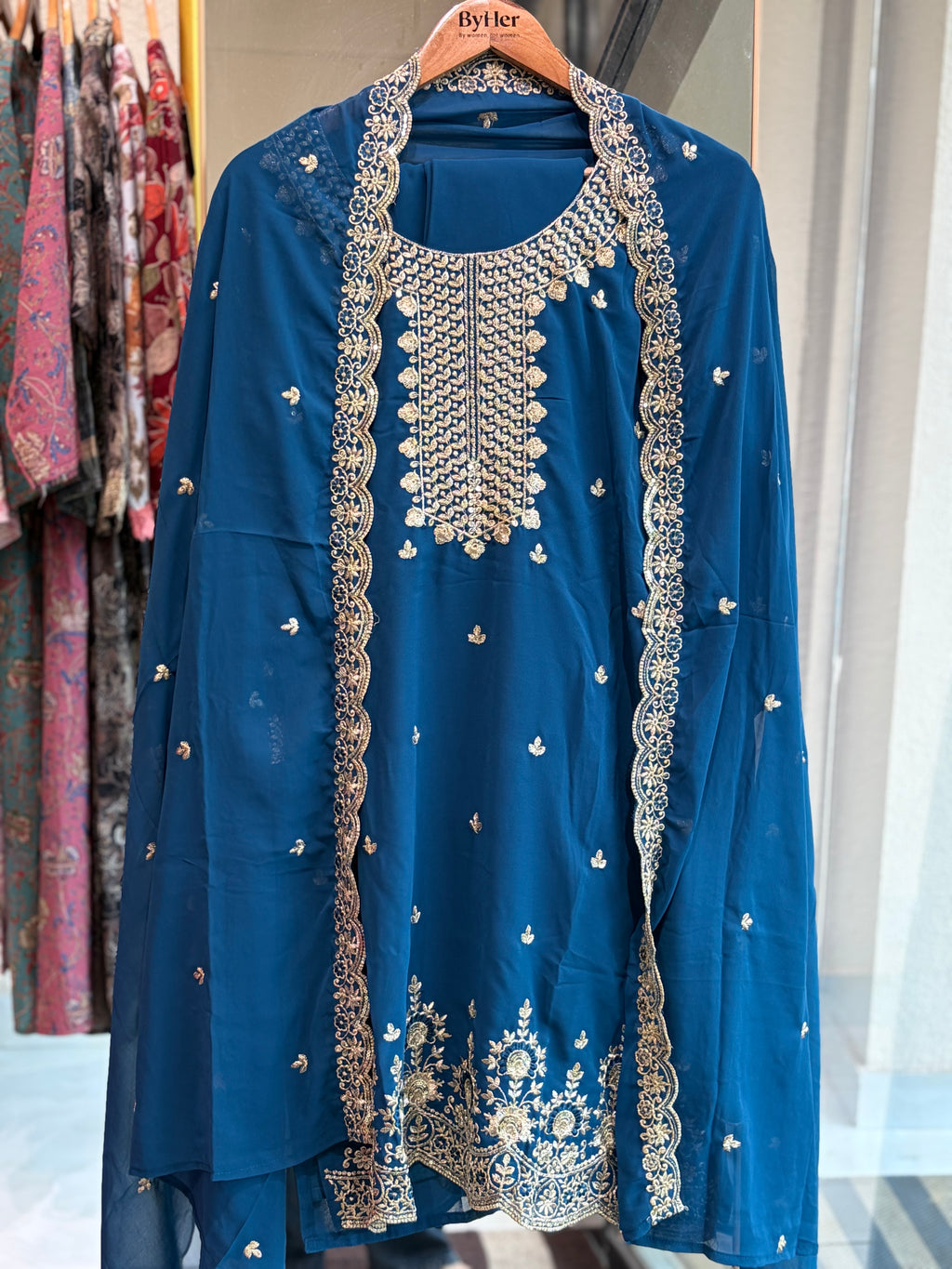 Chiffon Suit with Intricate Gold Zari Work
