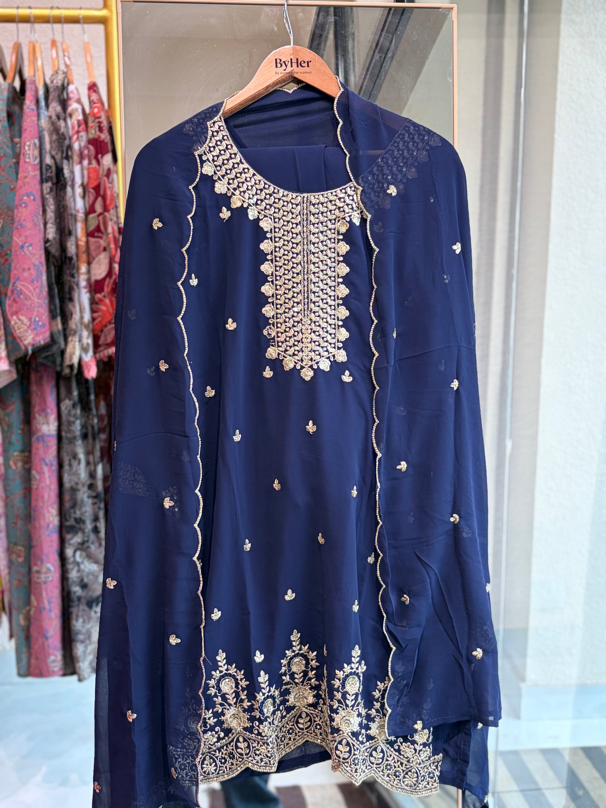 Chiffon Suit with Intricate Gold Zari Work